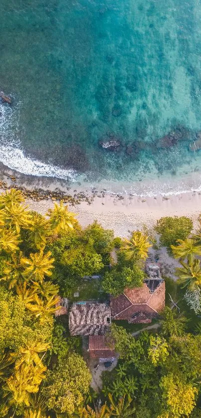 Aerial view of a tropical beach with lush greenery and turquoise waters.