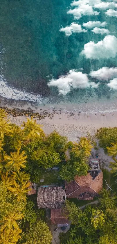 Aerial view of a tropical beach with lush greenery and turquoise waters.