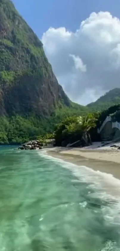 Tropical beach with mountains and turquoise sea.