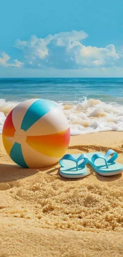 Beach scene with ball, flip-flops, and ocean.