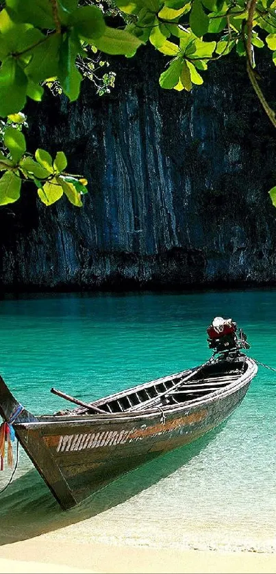 Tropical beach with a traditional longtail boat on turquoise water.