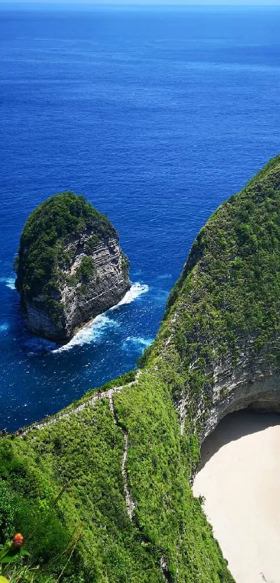 Breathtaking view of a cliff by a turquoise ocean with sandy beach.