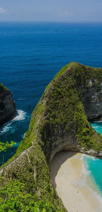 Tropical cliff and beach with turquoise water and lush greenery.