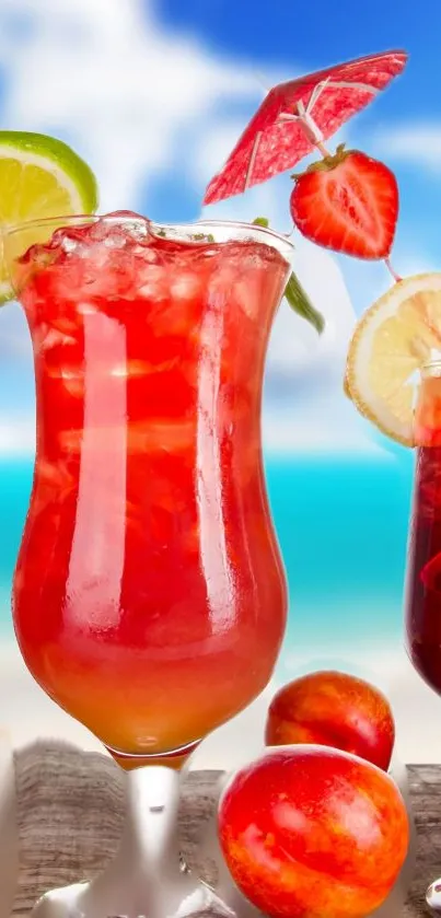 Vibrant tropical cocktails with fruit, on a beach with blue sky.