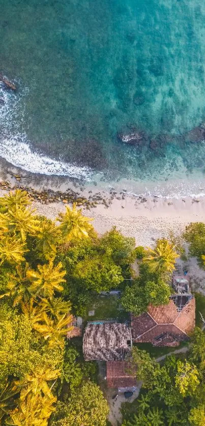 Aerial view of a tropical beach with lush greenery and turquoise waters.