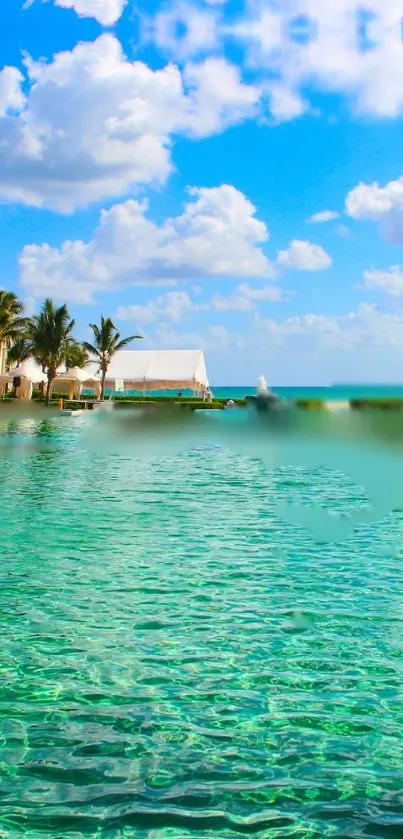 Tropical beach with turquoise water and a clear blue sky.