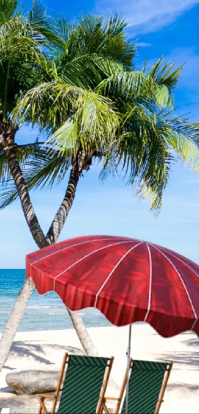 Tropical beach with palm trees and a red umbrella by the ocean under a blue sky.