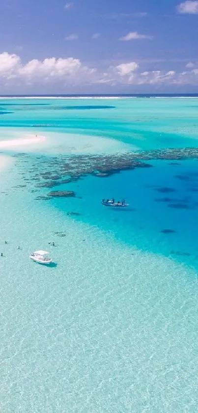 Aerial view of a tropical beach with turquoise water.