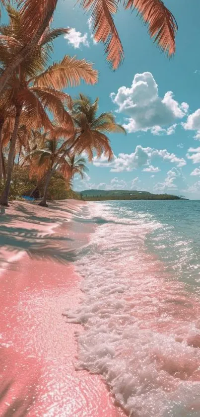 Tropical beach with pink sand and palm trees under a blue sky.