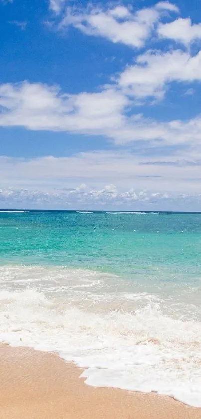 Tropical beach with waves and a clear blue sky for phone wallpaper.