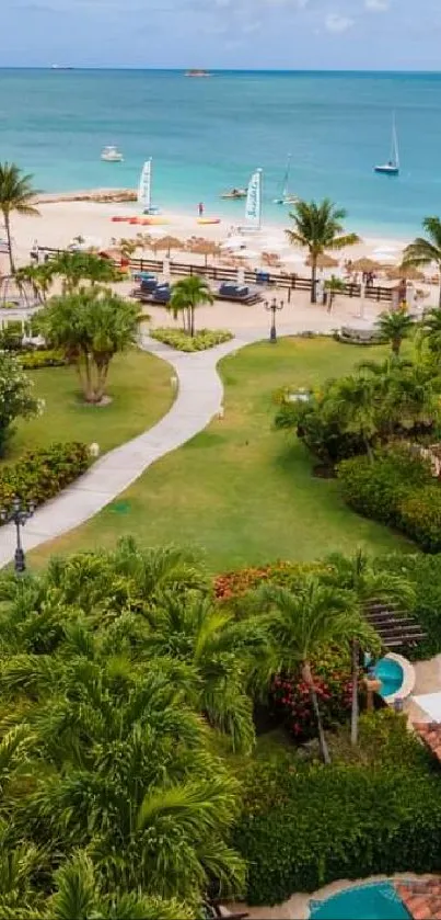 Aerial view of tropical beach resort with ocean and lush greenery.