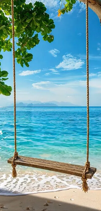 Swing on tropical beach with azure sea