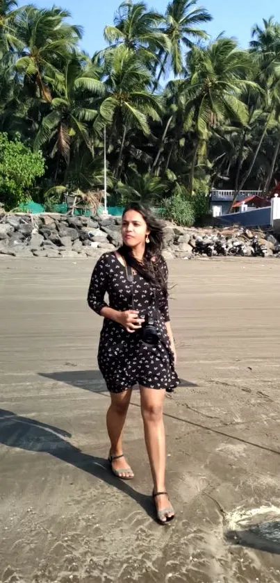 Woman walking on tropical beach with lush palm trees in the background.