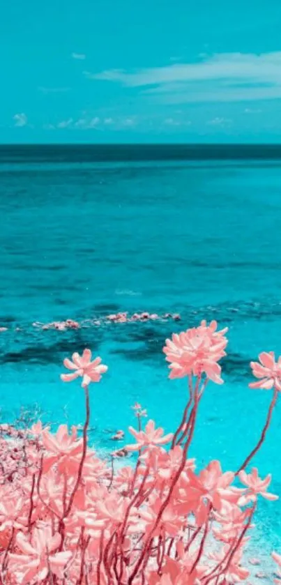 Tropical beach with pink flowers and blue sea.