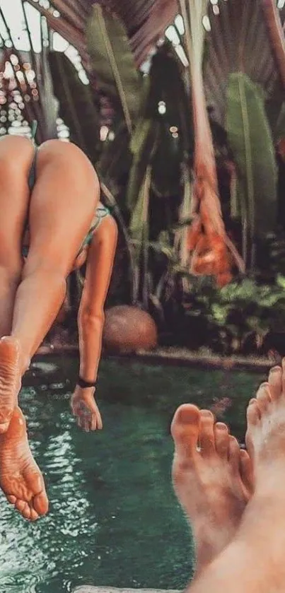 Woman diving into a tropical pool surrounded by lush foliage.