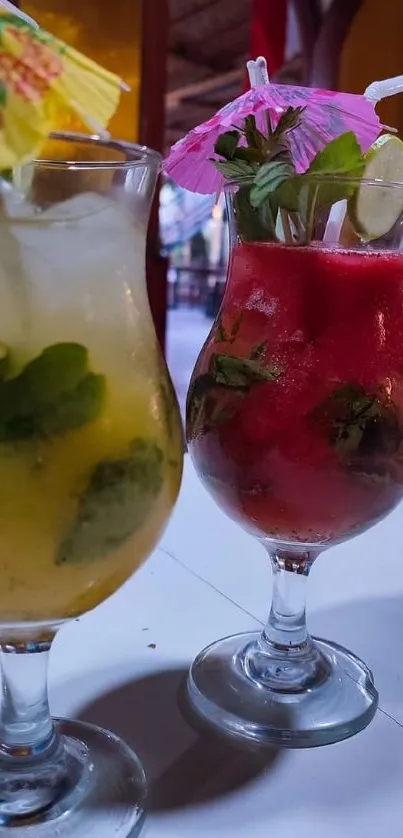 Vibrant tropical cocktails with colorful umbrellas in glasses.