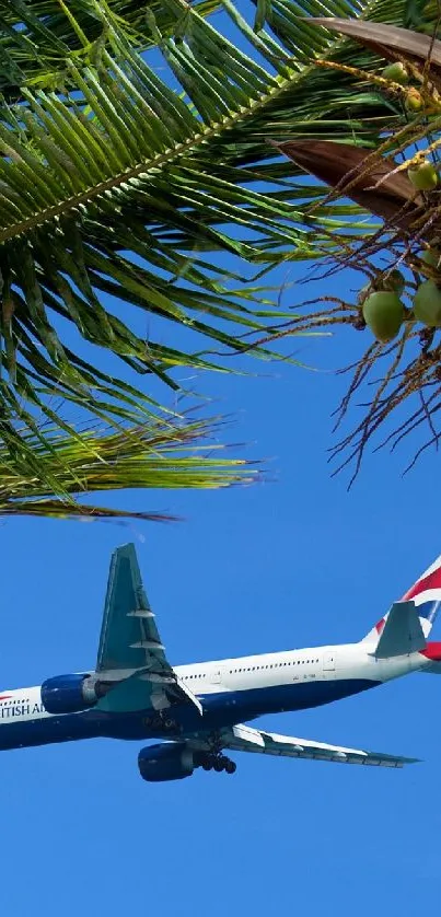 British Airways jet beneath palm leaves and blue sky.