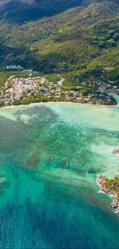 Stunning aerial view of a tropical island with turquoise waters and lush greenery.