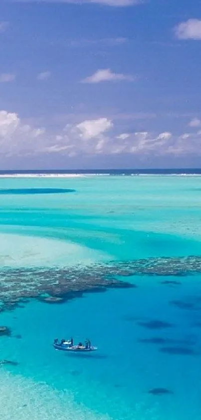 Aerial view of a tropical beach with turquoise waters and lush greenery.