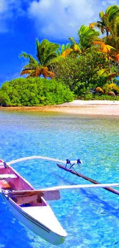 Tropical island beach with clear water and canoe.