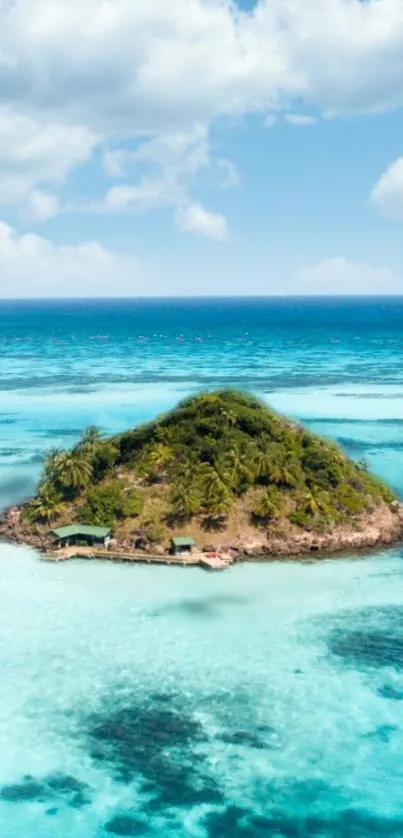 Tropical island with turquoise water under a blue sky.