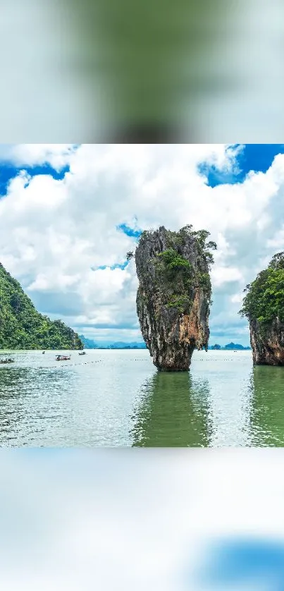 Tropical island with blue sky and greenery reflecting in water.