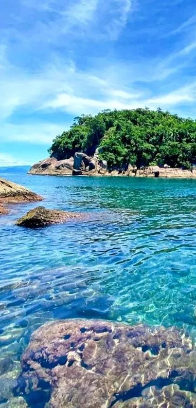 Tropical island with ocean and blue sky in wallpaper.