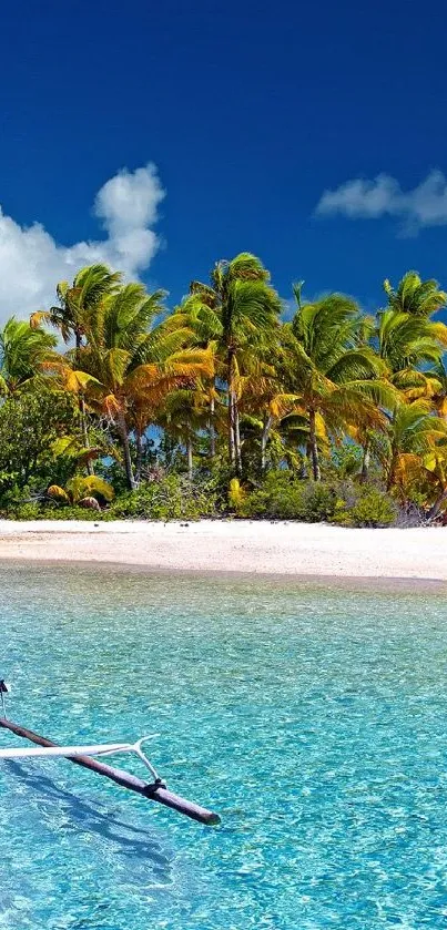 Tropical island with turquoise water and palm trees under a clear sky.