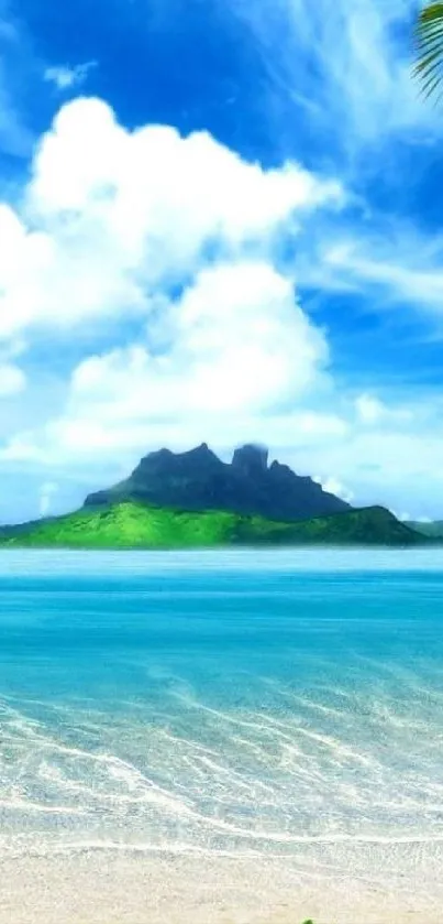 Tropical beach view with mountains and blue sky.