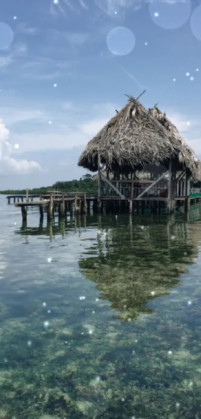 Tropical lakeside hut with reflection under blue sky.