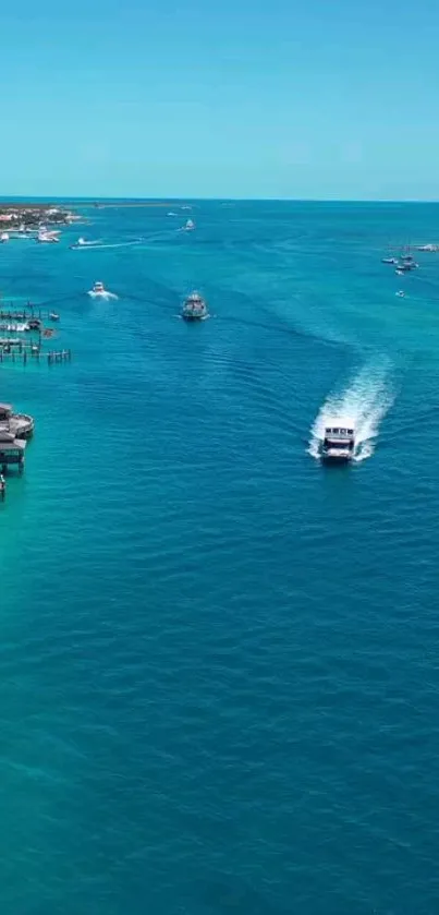 Tropical ocean view with boats and clear blue water.