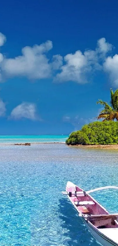 Tropical beach with clear waters, boat, and blue sky.