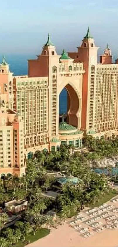 Aerial view of a luxury oceanfront resort with beach and blue sea.