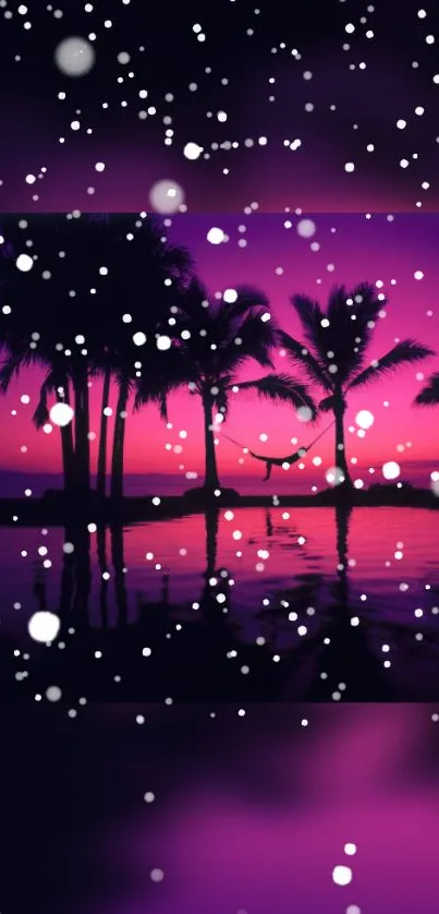 Silhouetted palm trees at sunset with snowfall on a tropical beach.