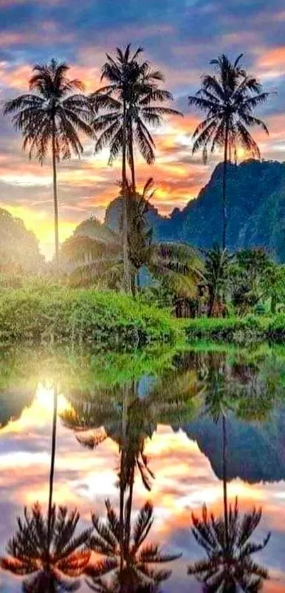 Tropical sunrise with palm trees reflected in calm water.