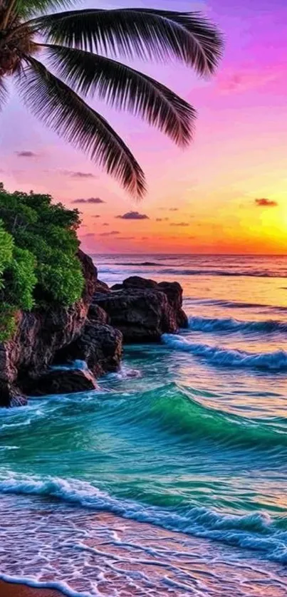 Tropical sunset with palm trees over ocean waves and a vibrant sky.