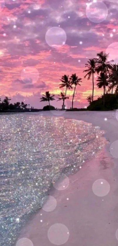 Pink sunset with palm trees on a shimmering beach.