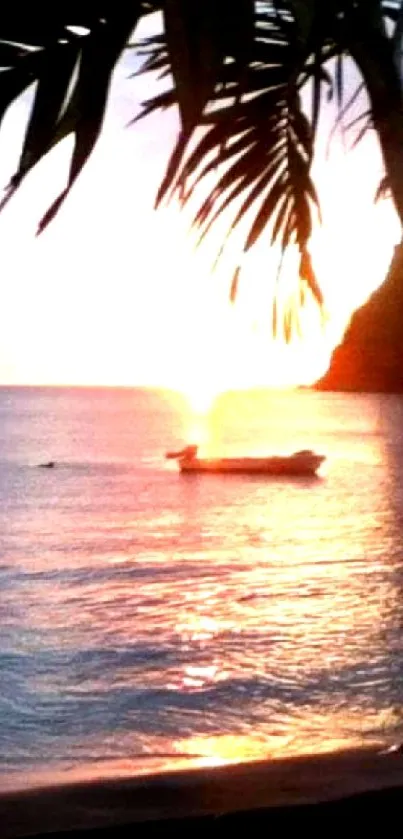 Tropical beach at sunset with a boat and palm leaves.