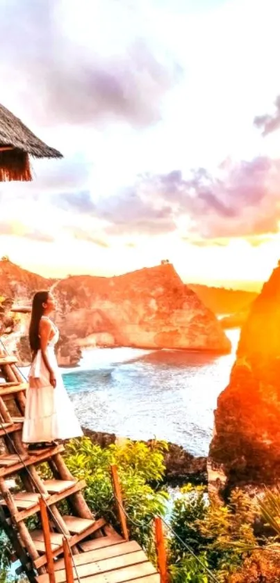 Woman gazing at sunset over a tropical cliffside, vibrant colors illuminate the scene.