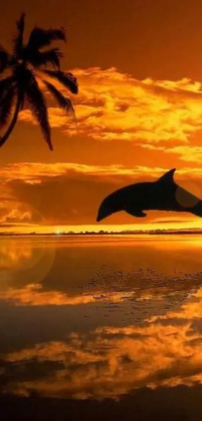 Silhouetted dolphin leaps in tropical sunset with palm trees.