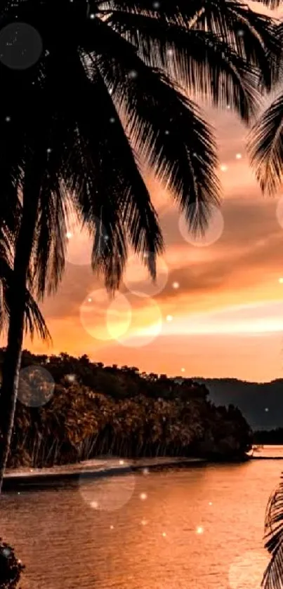 Sunset over tropical island with palm trees and orange sky.