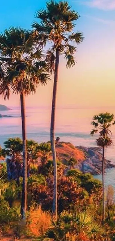 Tropical sunset with palm trees by the ocean, vibrant colors for mobile wallpaper.