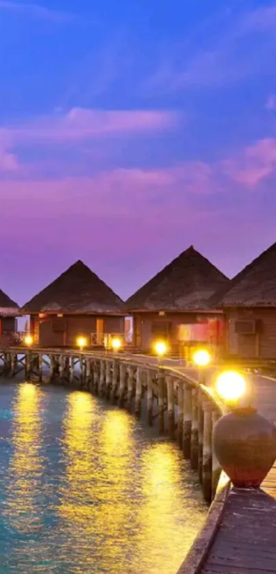 Tropical sunset with overwater bungalows reflecting in tranquil waters.