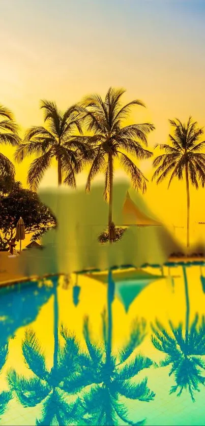 Vibrant sunset with palm trees reflected in a serene pool.