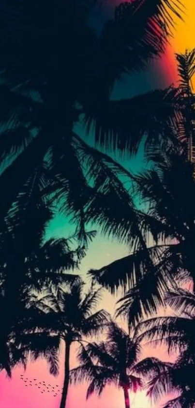 Silhouette of palm trees against a vibrant sunset sky, showcasing tropical paradise.