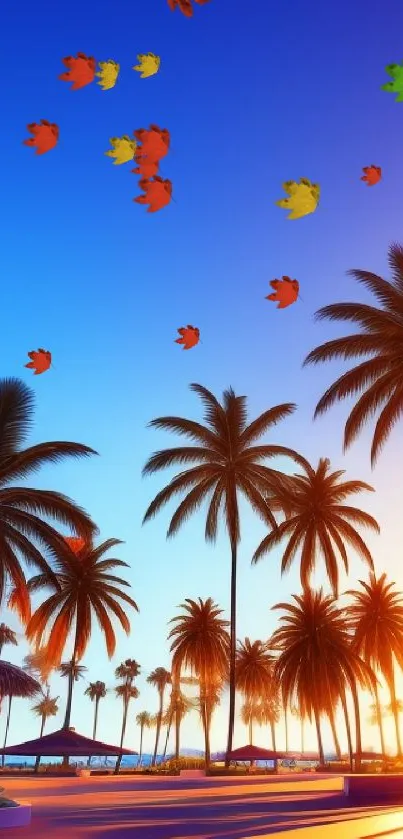 Tropical sunset with palm trees silhouetted against a vibrant blue and orange sky.