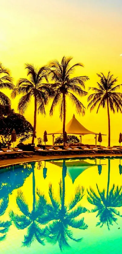 Tropical sunset with palm trees reflecting in a pool, creating a vibrant scene.