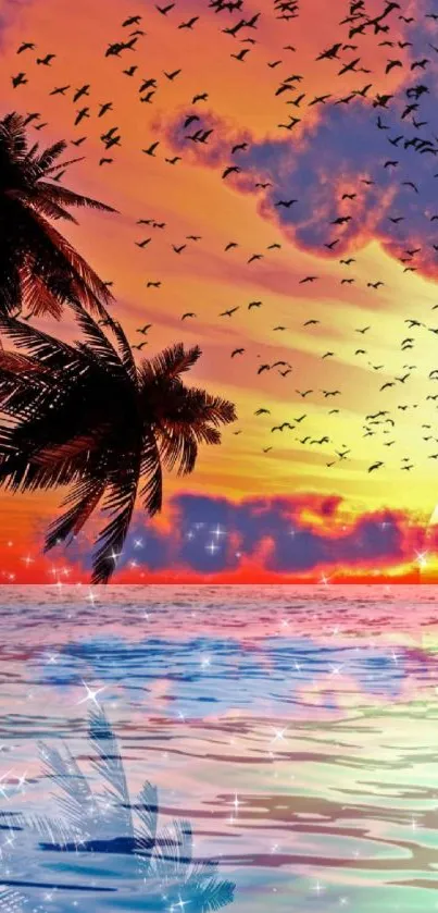 Tropical sunset wallpaper with palm trees and birds over the ocean.