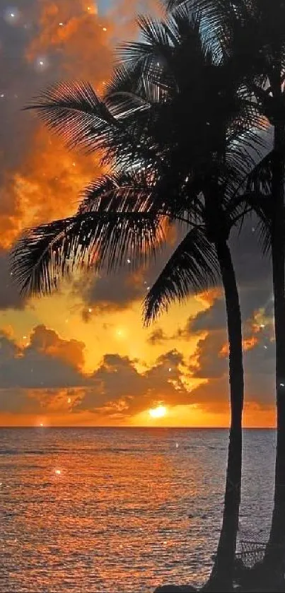 Tropical beach sunset with palm trees silhouetted against an orange sky.