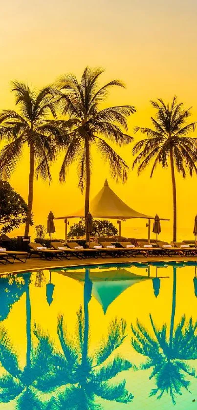 Tropical sunset with palm trees reflected in a pool.